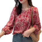 Stilvolle Bluse mit Laternenärmeln und floralem Muster